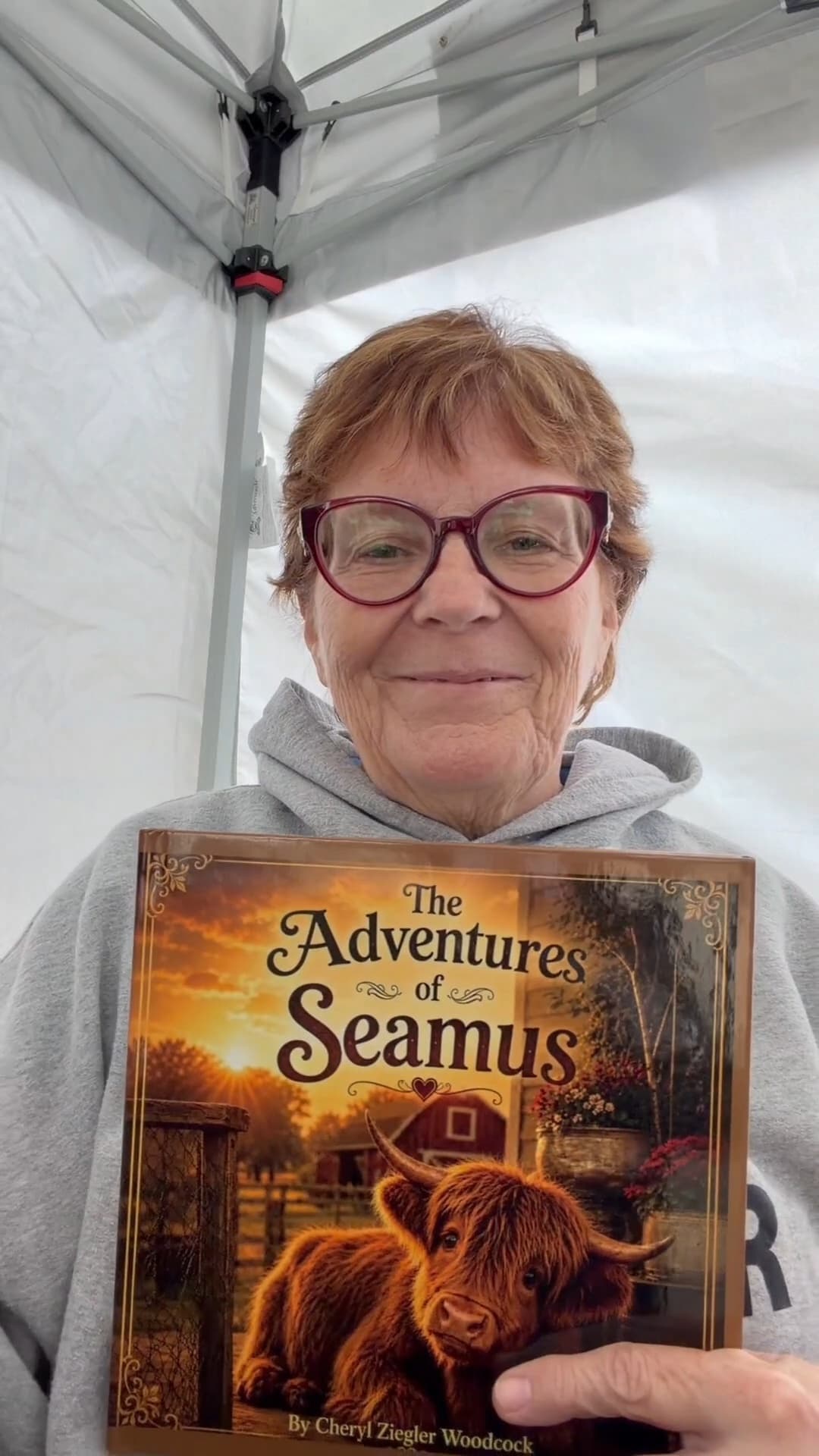 Cheryl Ziegler holding The Adventures of Seamus